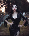 'Vampira' knee length dress in Black.