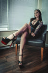 Amelia Latex asymmetrical hem halter dress in Black.