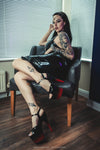 Amelia Latex asymmetrical hem halter dress in Black.
