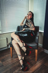 Amelia Latex asymmetrical hem halter dress in Black.