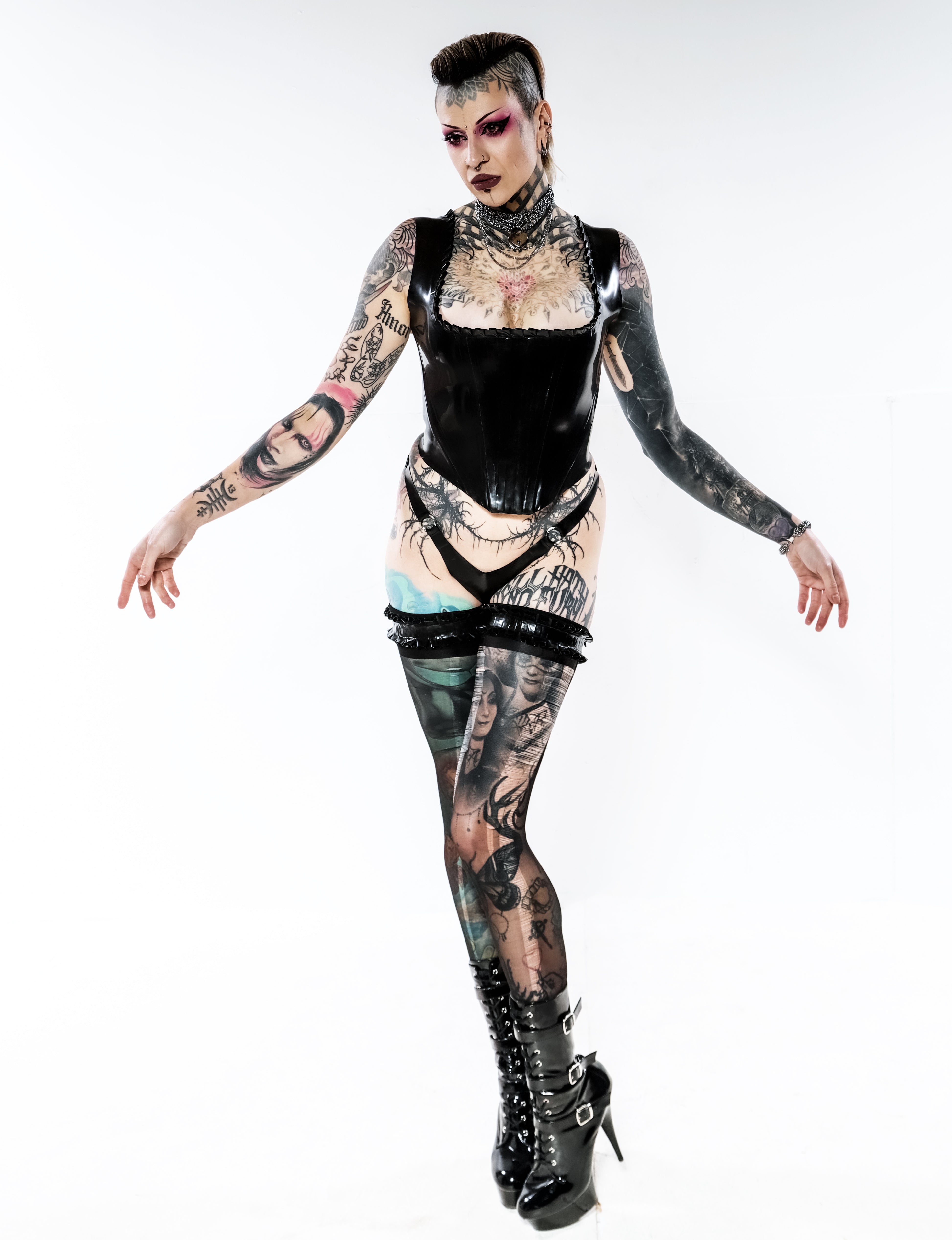 Kaydie Ruffled neck line corset top in Black, Lace up back.