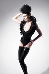 Reserved for D Express Latex Standing Collar bodysuit with deep v neckline.