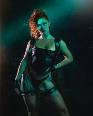 Kaydie Ruffled neck line corset top in Black, Lace up back.