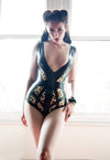 Latex Leopard Cage bodysuit in Black and Leopard.