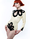 Latex Peacock bodysuit in Black and White with cut out detail.