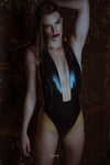 Latex Elissa Bodysuit in Black with Translucent Natural panels.